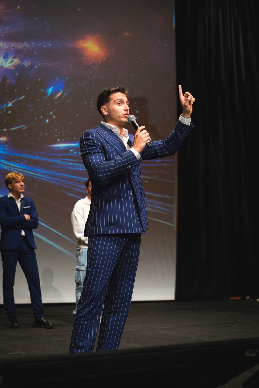 Jacopo pointing at the audience during his talk