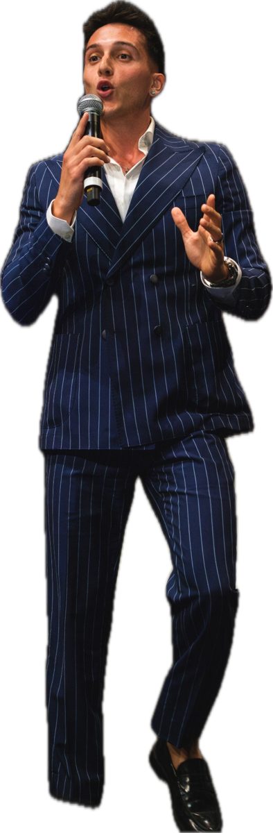 Jacopo James Nardi on stage with a microphone